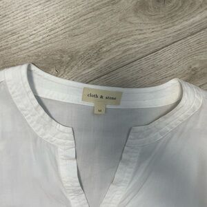 Beautiful white cloth and stone top. Never worn.